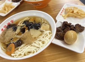 Main dish (noodle soup) and side dish (contains egg)  at Longhua Temple in Shanghai