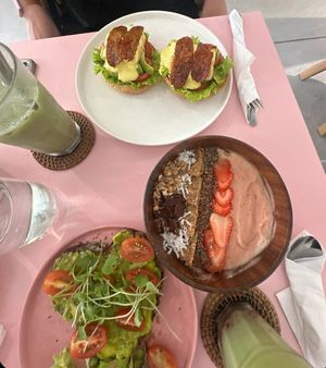 tofu benedict, smoothie bowl (happy stomach), avocado toast and 2 strawberry matcha latte at KURUMI - Healthy Vegan Food & Desserts in Hoi An