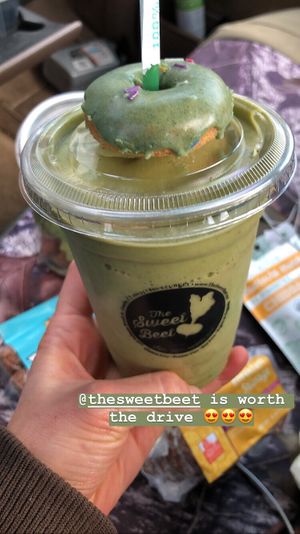 Vegan shamrock shake with tiny gluten free donut at The Sweet Beet in Granby