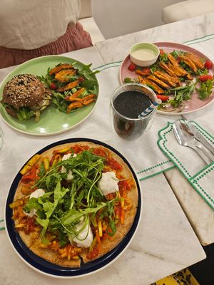 Vegan and gluten free pizza, carbon lemonade, vegan burger and sweet potato fries at HOPE in Baku