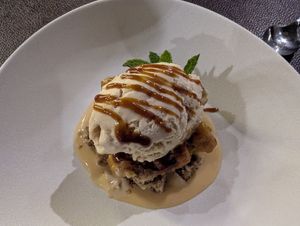 Vegan banana sponge with gofio ice cream and vanilla cream at Amêndoa - La Santa  in Lanzarote