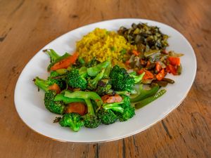  Fresh broccoli cooked with onion, garlic, tomatoes, jalapenos, and rosemary at Eat Today in St Louis