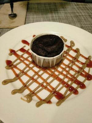 Couland con reducción de pacharán y crema pastelera at Sol Veggie in Logrono