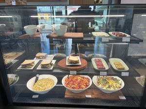 Cabinet food, all available to dine in or takeaway, salads, sweet slices and sandwich of the day.  at The Plant Based Pantry Limited in Ashburton