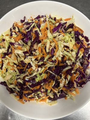 No mayo coleslaw in a mustard and apple cider vinegar dressing  at The Plant Based Pantry Limited in Ashburton