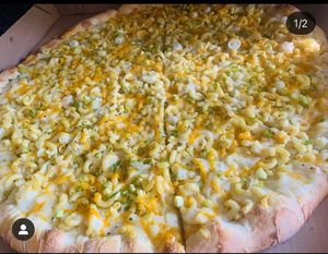 Mac and cheese pizza!!!  at Dimo's Pizza - Logan Square in Chicago