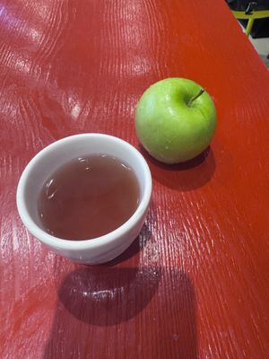 green apple and tea   at Clean Water Vegetarian - 净水素食 in Shanghai