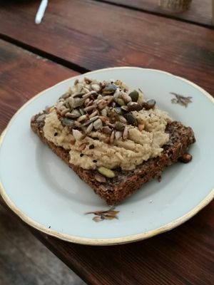 hummus, roasted seeds and five spice on rye ☺ at Vi Modtes Gennem Ruden in Copenhagen