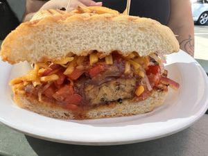 BBQ Tempeh Cheesesteak Sandwich
Choice of organic tempeh or organic tamari tofu grilled with
smoked chili BBQ sauce, onions, sweet peppers & Jack cheese on a French roll.  at Afternoon Deli in Grass Valley