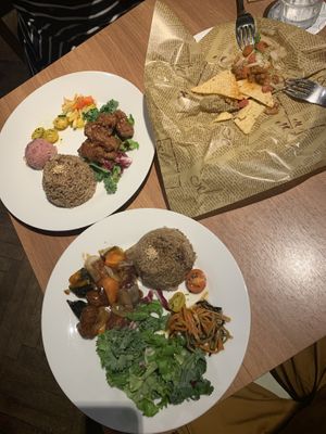 Mostly eaten nachos and two karage plates at Ko-So Cafe in Tokyo