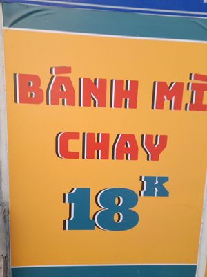 A bánh mi sign at PHÚC AN 1986 in Ho Chi Minh City