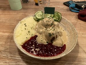 Vegan Meatballs with mashed potatoes, cucumber salad and lingonberry sauce  at Meatballs & Pancakes in Stockholm