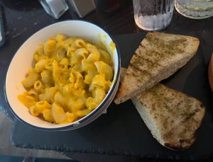 Vegan Mac and cheese with garlic breadd  at The Fox and Faun in Edinburgh