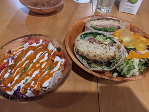 Chickpea mushroom burger with a side of avocado salad at All The Way Live in Philadelphia