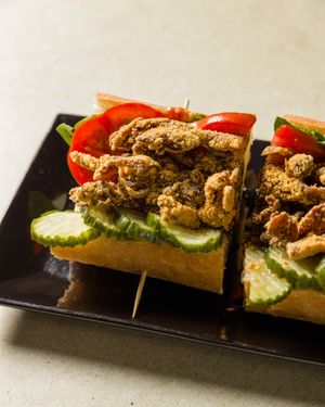 Mushroom Po'boy.  Cornmeal crusted fried mushrooms, house made pickles, vegan lemon tarragon mayo. Vegan. at Brooklyn Street Local in Detroit