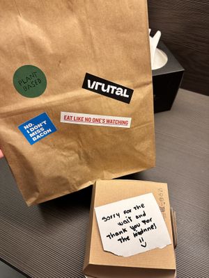 Take away cheesecake, lovely message and cool stickers 😎  at Vrutal - Diputació in Barcelona