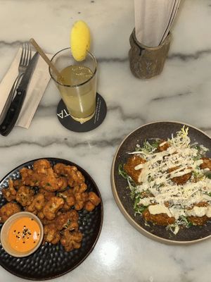 cauliflower wings + caesar salad  at Vrutal - Diputació in Barcelona