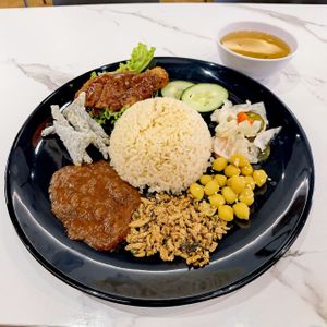 Nasi Lemak with Drumstick.

The rice was very fragrant and it was a good sized portion. at Kang Su Vegetarian 康素 - Macpherson  in Central Singapore