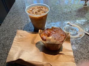 Vegan muffin and almond latte at Coffee Project New York in New York City