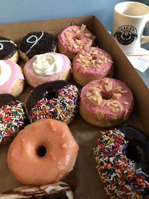Peppermint patty, rose water, chocolate with sprinkles, blood orange, coffee at Glory Doughnuts & Diner in Frederick