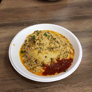 Fufu with egusi (+ extra chili sauce) at Kilimanjaro African Food in Dortmund