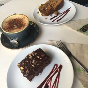 Oat milk Capp & vegan brownie plus vegan carrot cake  at The Lighthouse Cafe in Galway