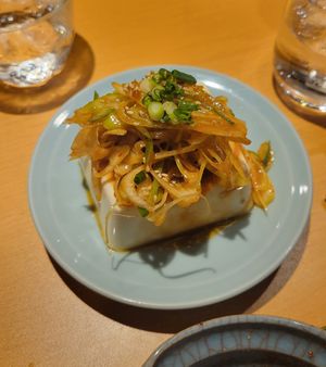 Chili oil and leeks over chilled tofu (okay) at Vegan Izakaya Nowhere in Tokyo