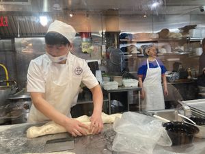 They make the noodles in front of you at 1915 Lanzhou Hand Pulled Noodles  in New York City