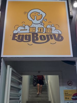 Shop sign at EggBomb Cafe in Johor Bahru