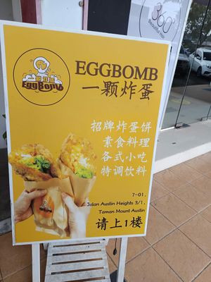 Board outside at entrance at EggBomb Cafe in Johor Bahru