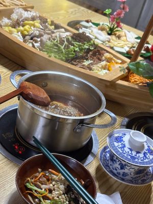 The menu including the hot pot, selection of mushrooms, tofu and homemade tea at Chongqing Donghua Temple Vegetarian Hot Pot in Chongqing