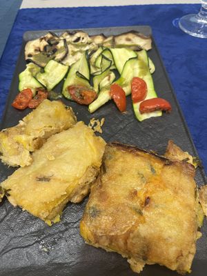 Millefoglie di tempeh e patate  at Trattoria MODErNA in Montale