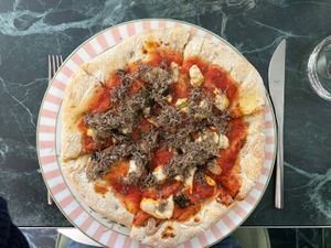 Pizza with friarielli and black truffle  at La Jungle de Plein in Milan