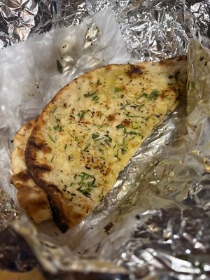 Garlic naan (not vegan) at Lazeez Indian in Wake Forest