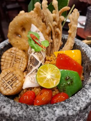 Fried rice with mushrooms and coconut at Vegan Pranakhon in Bangkok