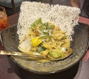 Stir-fried Organic Tofu with In-House Curry Sauce:
Organic Tofu, Onion, Bell Peppers, Jackfruit, Curry Powder, Spices, Crispy Rice Noodle at Vegan Pranakhon in Bangkok