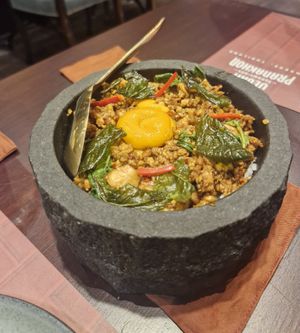Stir-fried Thai Basil with Tofu Minced Pork & Vegan Egg Yolk:
Tofu, Chili, Basil Leaves, Soy, Tomato, Jasmine Rice at Vegan Pranakhon in Bangkok