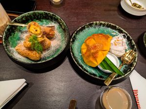 Banana Fritters and Mango Sticky Rice desserts at Vegan Pranakhon at Vegan Pranakhon in Bangkok