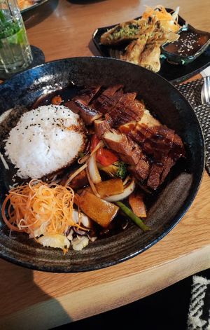 Vegan duck in the front, spring rolls in the back at My Mem in Hannover