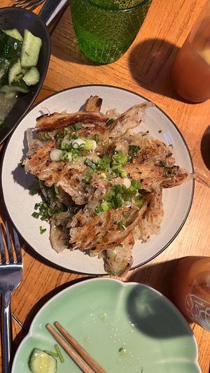 Vegan scallion pancakes and corner of cucumber salad  at Sichuan Alley Bistro in West Hartford