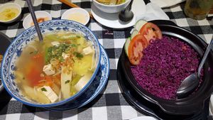 Sour soup and purple fried rice at Rou Vegetarian in Ho Chi Minh City