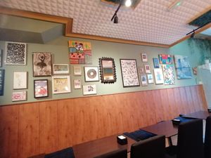 Art for sale up on their gallery wall at Casa Ramos in Santiago De Compostela