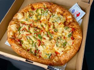 12" pepperoni pizza + green peppers + pineapple (garlic crust) at Modena Pizza & Pasta in Seattle