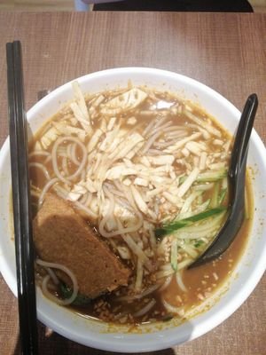 Asam laksa noodles at Zhenyi Veggie Place 真一素食坊 in Northeast Singapore