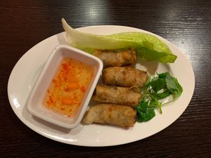 Deep fried spring rolls with fresh herbs. at Banh Xeo Saigon in Berlin