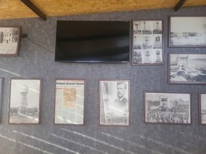 Historical info about the water tower on the walls at Bukhara Tower Restaurant in Bukhara