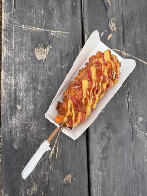 vegan corndog with mustard, ketchup, and sugar  at Yonggung Rest Area - 용궁휴게소 in Busan