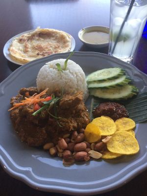 Nadi Lemak with soy beef rending, and roti cannai  at Malaysian Chapter in Belconnen
