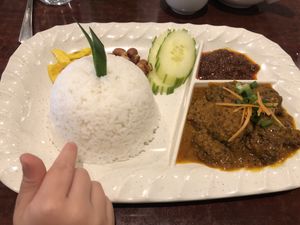 Pardon my toddler poking at the rice 😂 Nasi lemak with “beef” rendang - still my favourite! So yummmm! ❤️❤️ at Malaysian Chapter in Belconnen