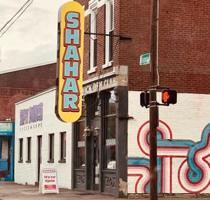 Corner of Logan and Mary St. Street parking at Shahar in Louisville